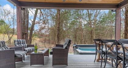 Modern Black Cabin w/ Hot Tub