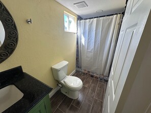 Shower, towels, soap, toilet paper