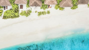 Playa privada y playa de arena blanca