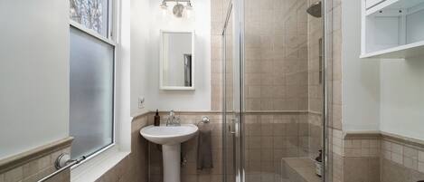 Shower, hair dryer, towels, soap