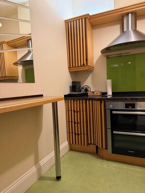 Fridge, microwave, oven, stovetop - Central 3 BR Home with Private Courtyard (Ely)