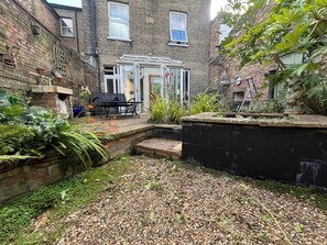 Terrace/patio - Central 3 BR Home with Private Courtyard (Ely)