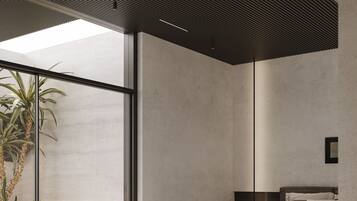 Luxury Suite | Desk, blackout drapes, iron/ironing board, free WiFi