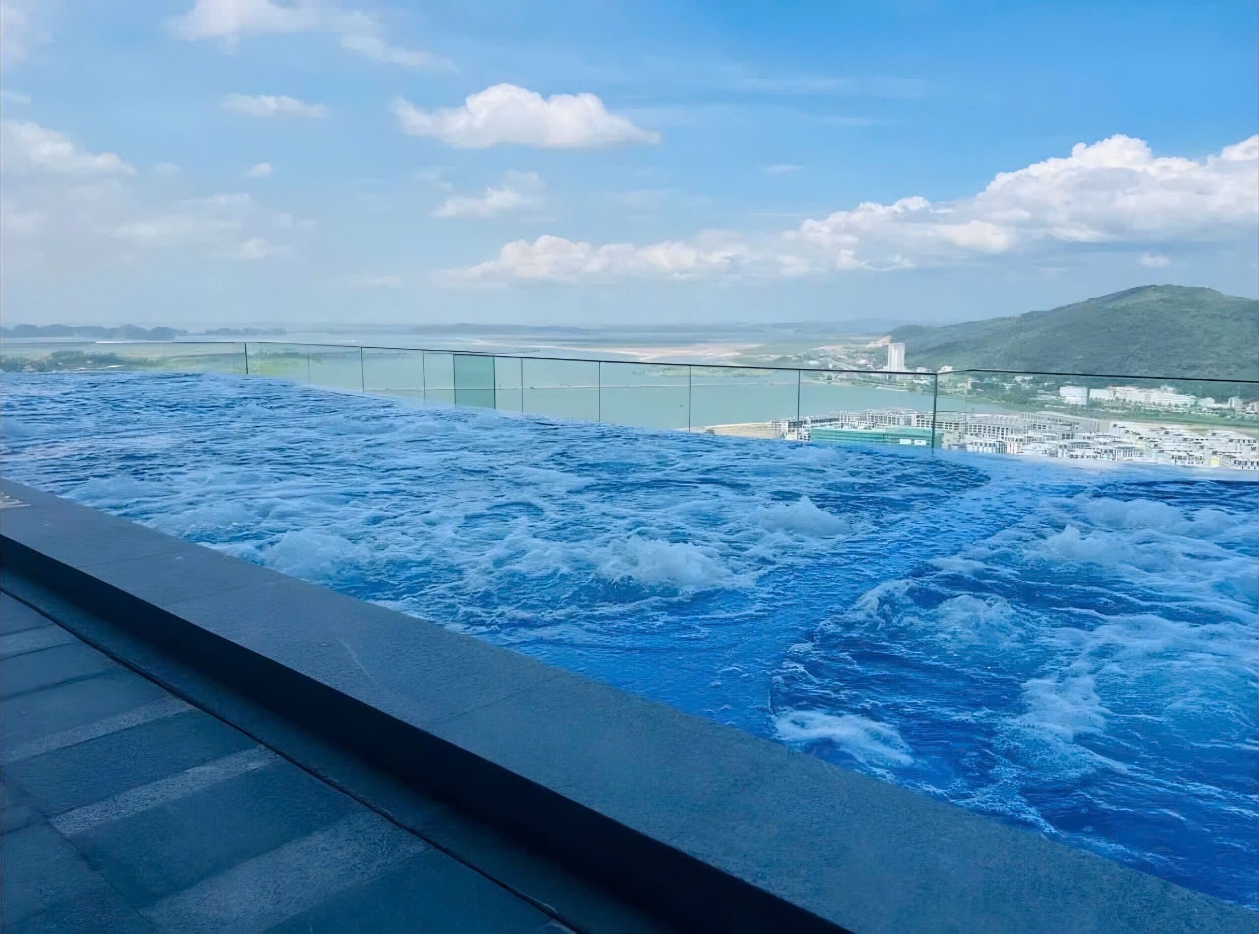 Indoor pool, pool umbrellas, pool loungers