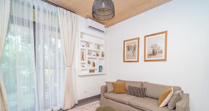 24/7 power 1-bedroom condo with on-site pool. Short 500meters walk to Paje Beach