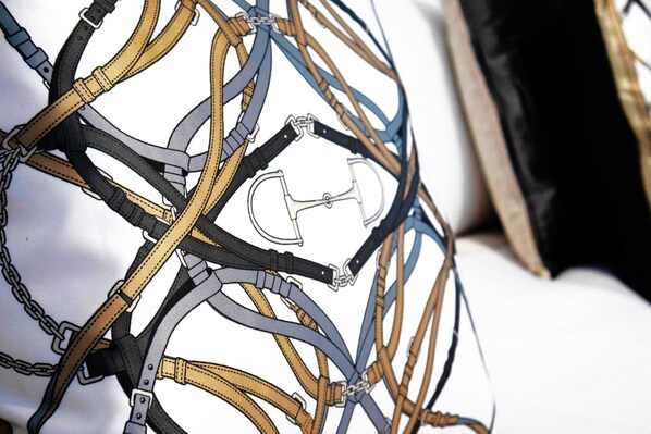A close-up of a complex harness system with multiple straps and buckles. - THE QUARTERS #2 Centrally located modern 2 bed unit featuring stylish decor (East Tamworth)