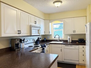 Fridge, microwave, oven, stovetop - Sea Oats 1BR Condo – Pool, Beach, Boat Slip (Englewood)