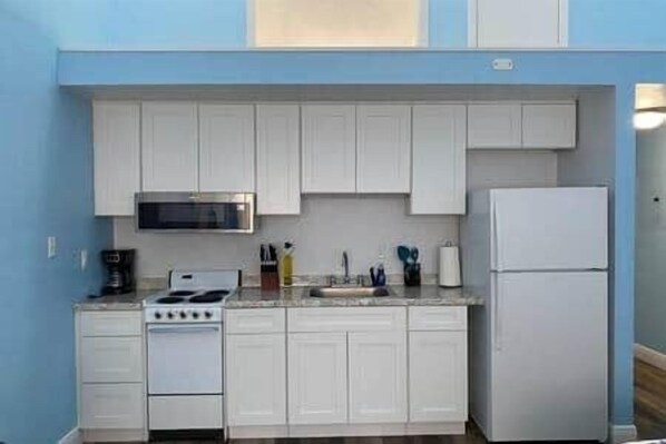 Fridge, microwave, oven, cookware/dishes/utensils