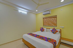 Habitación Deluxe | Sábanas de algodón egipcio, ropa de cama de alta calidad y wifi gratis 