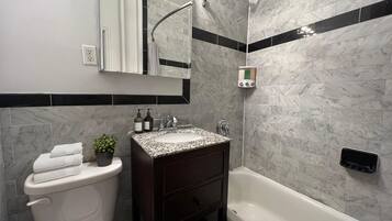 Hair dryer, towels, soap, shampoo