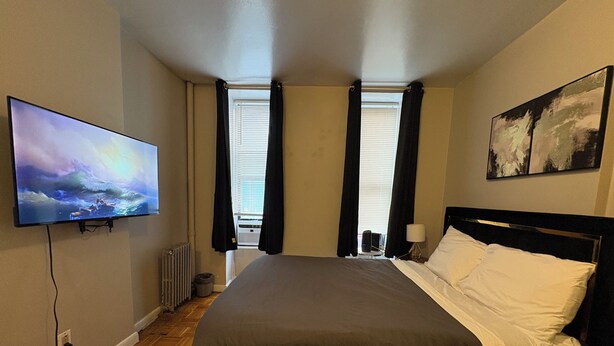 1 slaapkamer, een strijkplank/strijkijzer, reisbedje, gratis wifi