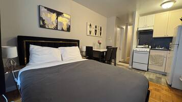 1 dormitorio, tabla de planchar con plancha, cuna de viaje y wifi gratis