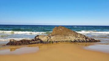 On the beach, beach towels