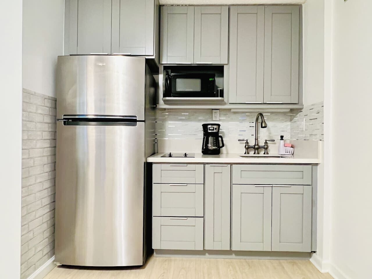 Fridge, microwave, stovetop, coffee/tea maker