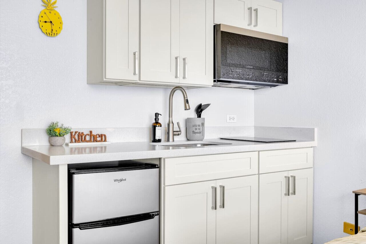 Fridge, microwave, stovetop, coffee/tea maker