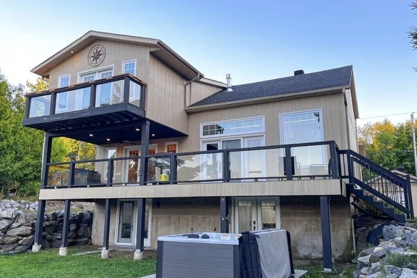 rear of cottage faces the Baptiste lake