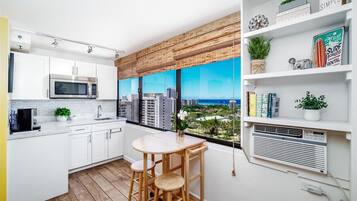 Fridge, microwave, stovetop, coffee/tea maker
