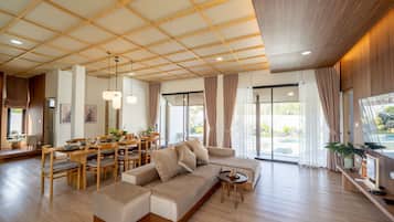 Villa Deluxe, vistas al jardín | Zona de estar