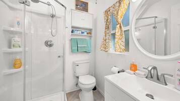 Shower, towels, toilet paper
