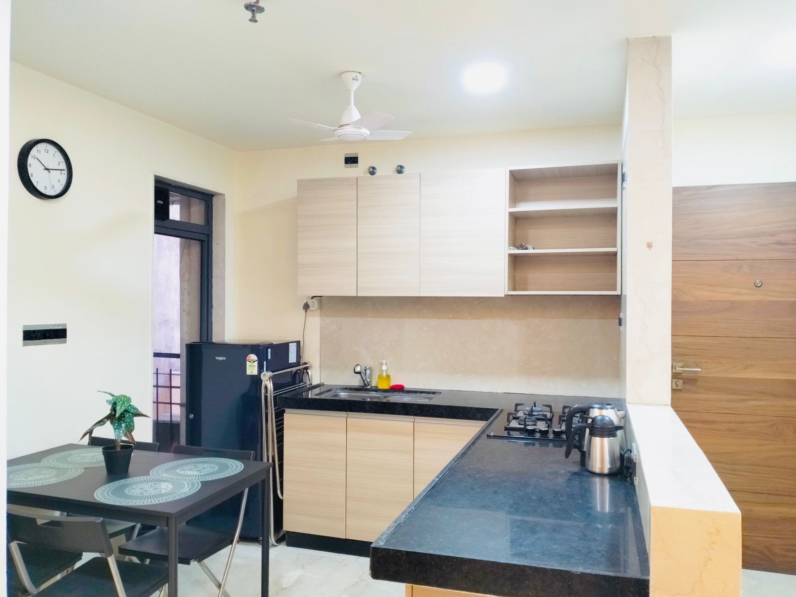 Fridge, stovetop, dining tables