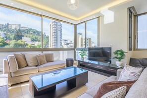 Apartamento, 3 quartos, cozinha, vista para a cidade | Área de estar | Smart TV, Netflix, serviços de streaming