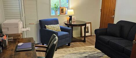 TV, fireplace, books, printers