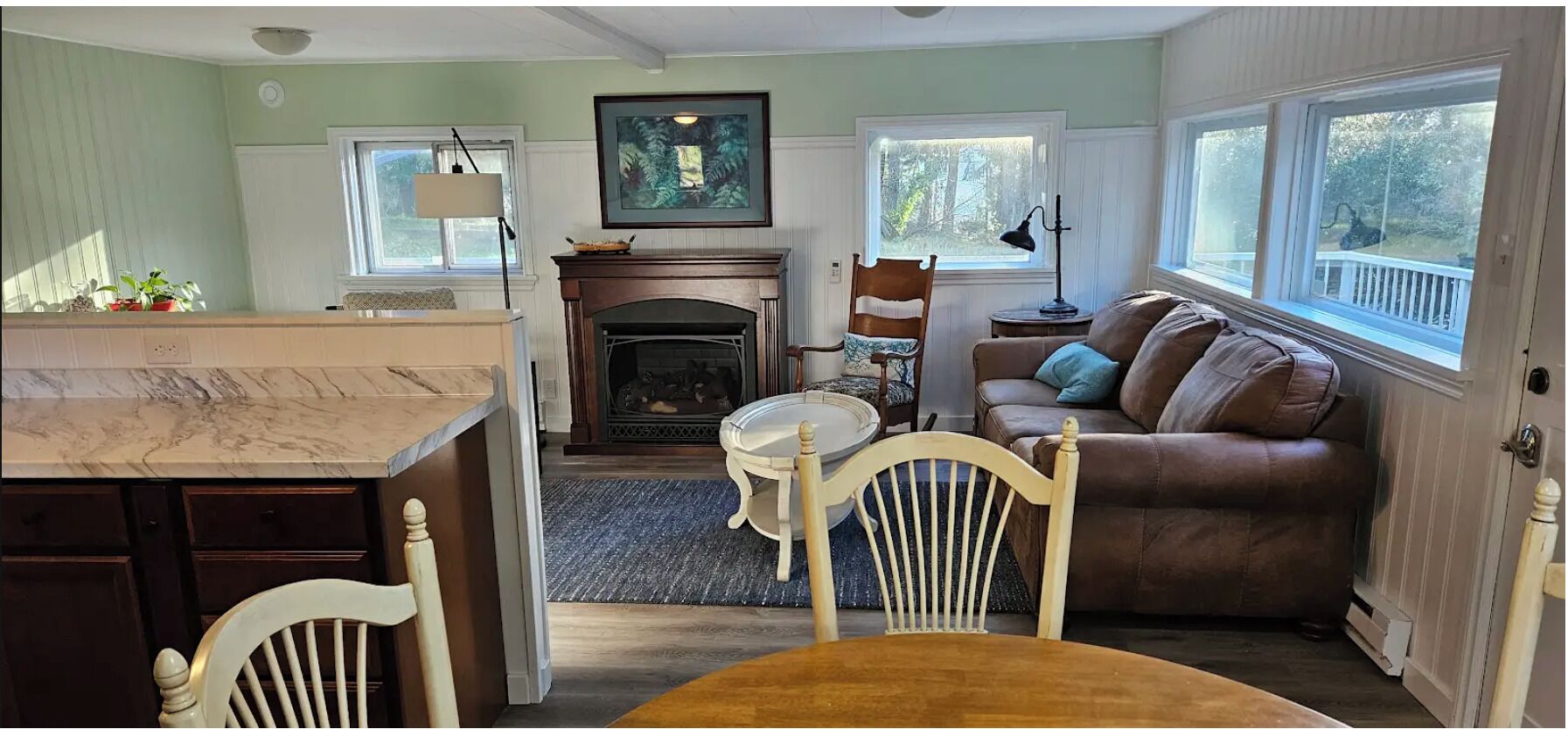 TV, fireplace, books, printers