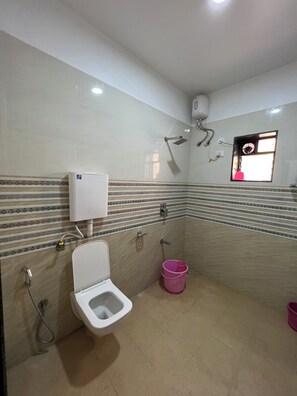 Deluxe Room | Bathroom | Shower, towels, soap, toilet paper - Iira Stays Ocean Bliss (Alibaug)