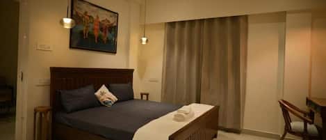 In-room safe, laptop workspace, blackout drapes, soundproofing