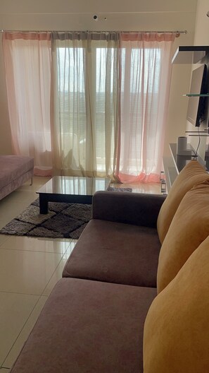 Living area - Stay with a swimming pool, gym and free walking space within the property (Mysore)