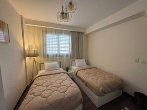 2 habitaciones, tabla de planchar con plancha y wifi gratis 