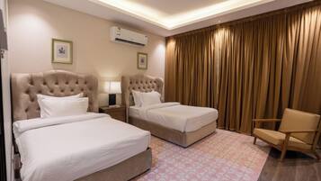 Familiesuite - byudsigt | Pengeskab på værelset, strygejern/strygebræt, gratis Wi-Fi