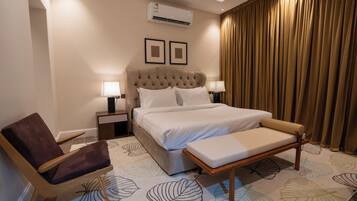 Family Suite, City View | In-room safe, iron/ironing board, free WiFi