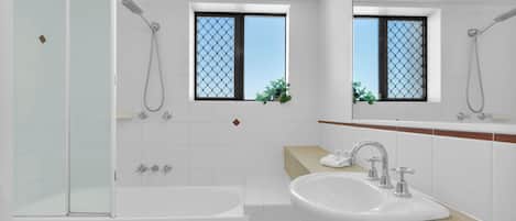 Shower, hair dryer, towels, soap