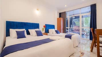 Deluxe Triple Room, Balcony | Free WiFi