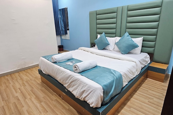 Deluxe Double Room, City View | Laptop workspace, iron/ironing board, free WiFi