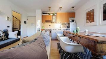 Condo, 2 Bedrooms | Living room | Books