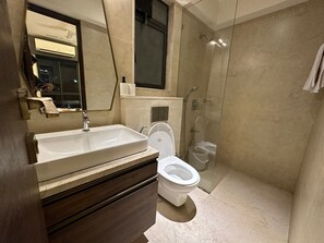 Shower, towels, soap, shampoo