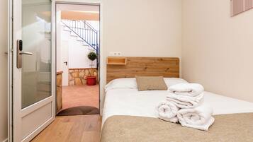 Deluxe tweepersoonskamer | Een bureau, gratis wifi, beddengoed