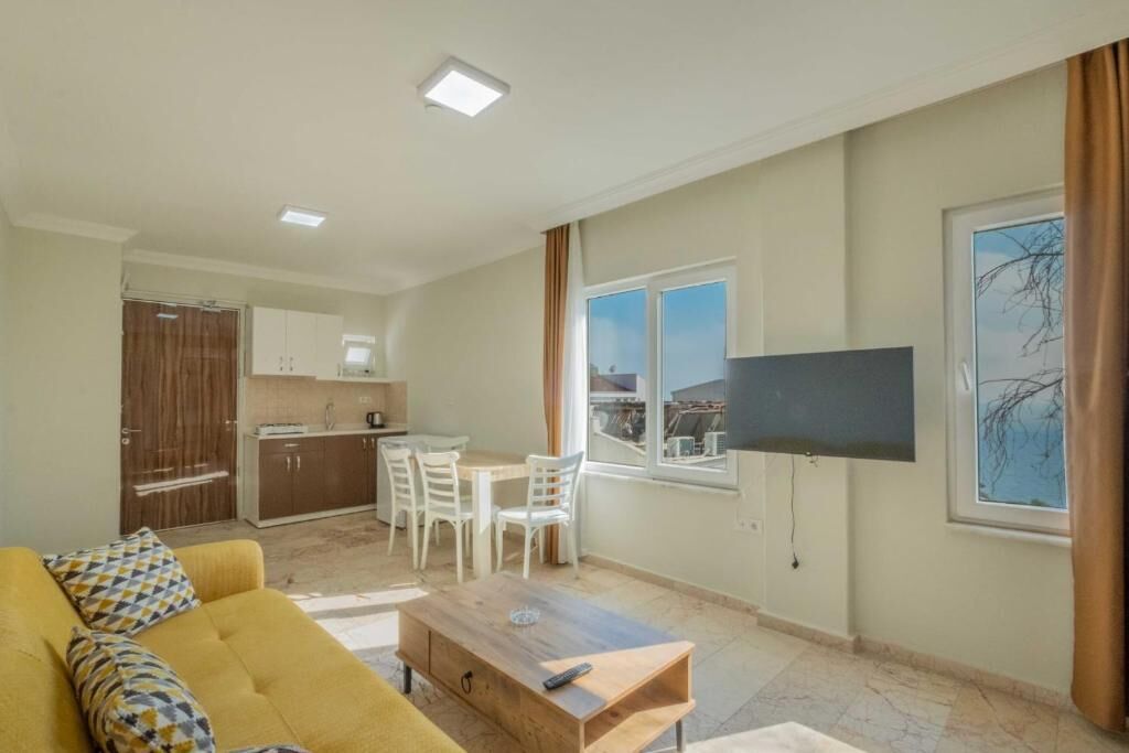 Deluxe Apartment, Sea View | Living area