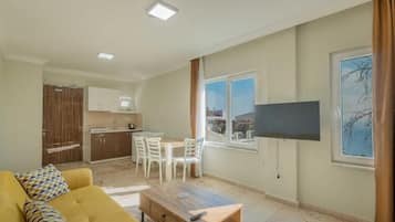 Deluxe Apartment, Sea View | Living area