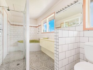 Shower, towels, soap, toilet paper