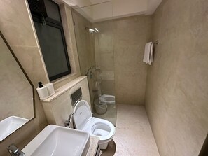 Dutxa, tovalloles, sabó i xampú 