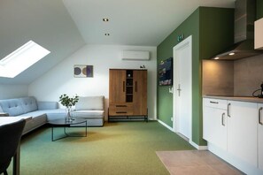 Deluxe Suite, Non Smoking | Living area | 32-inch Smart TV with digital channels, Netflix, streaming services - City Housing Genk (Genk)