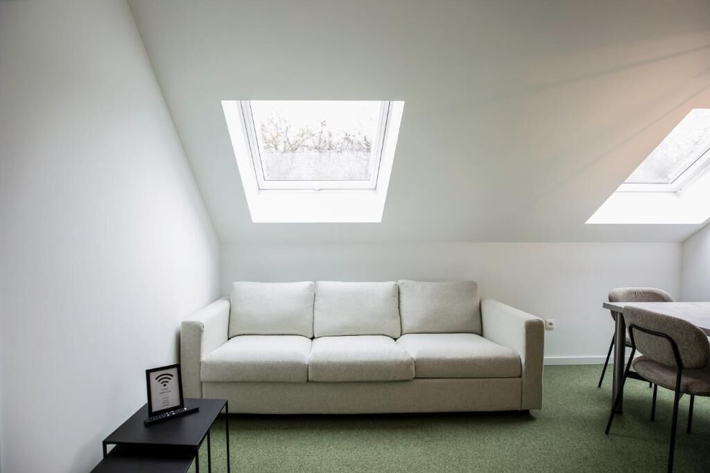 Familie suite, niet-roken | Woonruimte | Een 32-inch smart-tv met digitale zenders, Netflix en streamingdiensten