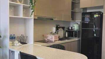 Shared fridge, microwave, espresso maker, coffee/tea maker