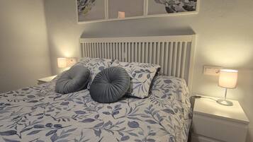 2 dormitorios, tabla de planchar con plancha, wifi gratis y ropa de cama