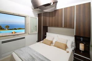 4 bedrooms, in-room safe, iron/ironing board, travel cot