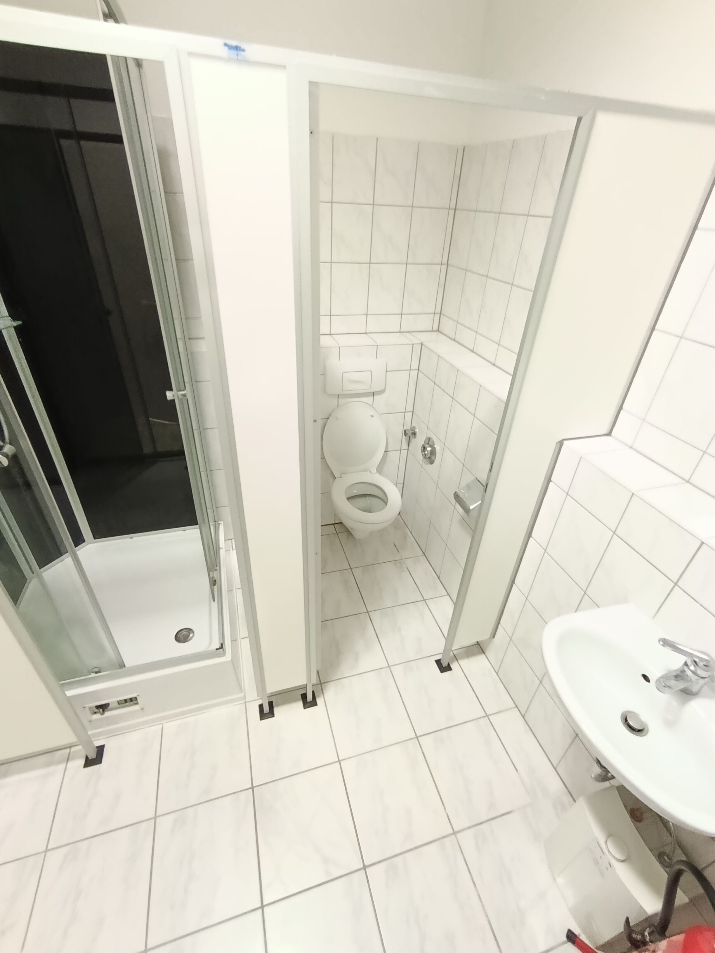 Shower, towels, soap, toilet paper