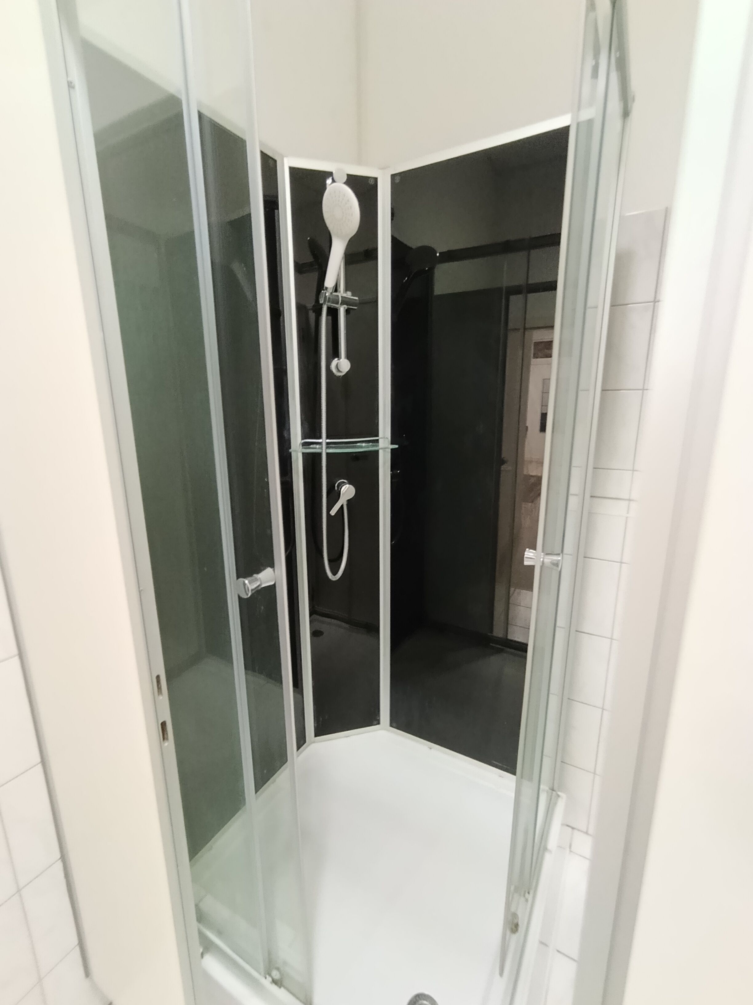 Shower, towels, soap, toilet paper